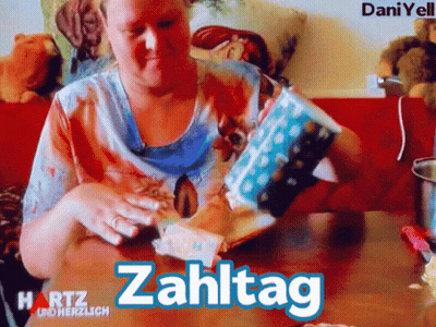 Woman Sitting At Table With Zahltag GIF