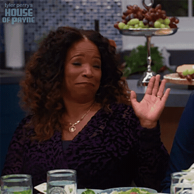 Woman Sitting At Tyler Perry House Of Payne Sign GIF
