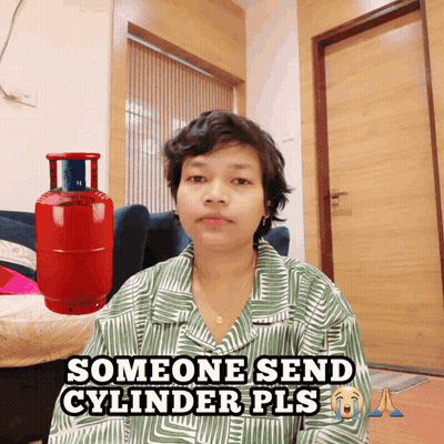 Woman Sitting By Red Gas Cylinder Someone Send Cylinder Pls GIF