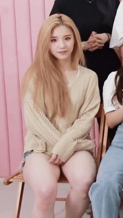 Woman Sitting Crossed Legs On Chair GIF