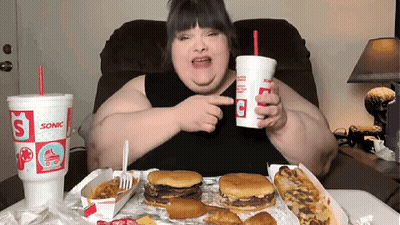 Woman Sitting Holding Sonic Cup GIF