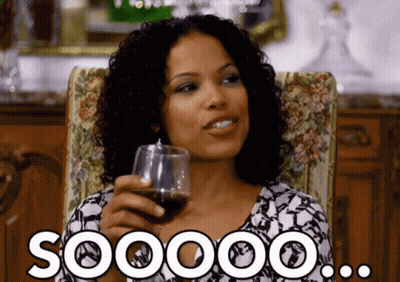 Woman Sitting Holding Wine Saying Soooo GIF