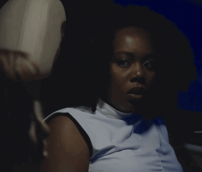 Woman Sitting In Back Seat Eyes Closed GIF
