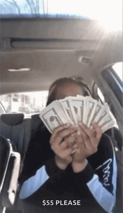Woman Sitting In Back Seat Holding Fan Of Money GIF