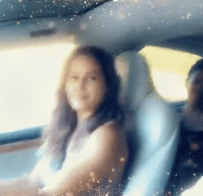 Woman Sitting In Back Seat With Man Behind GIF