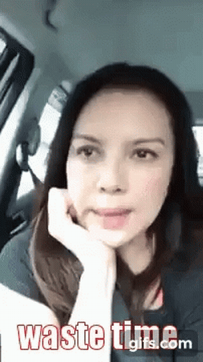 Woman Sitting In Car Hand On Chin Waste Time GIF