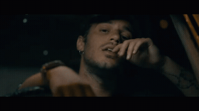 Woman Sitting In Car Hand On Hair GIF