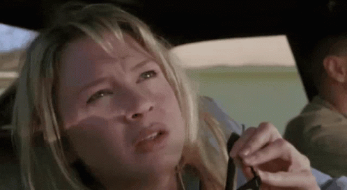 Woman Sitting In Car Holding Sunglasses GIF