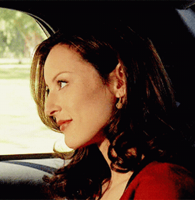 Woman Sitting In Car Looking Out Window GIF