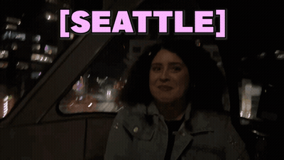 Woman Sitting In Car Saying Seattle GIF