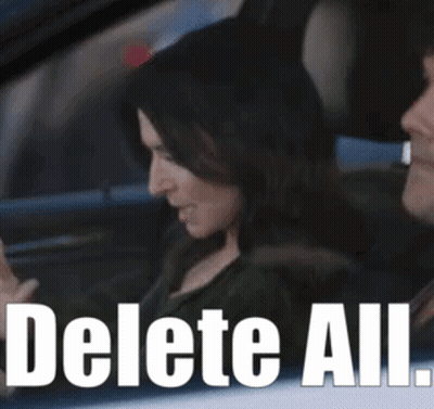 Woman Sitting In Car With Delete All GIF