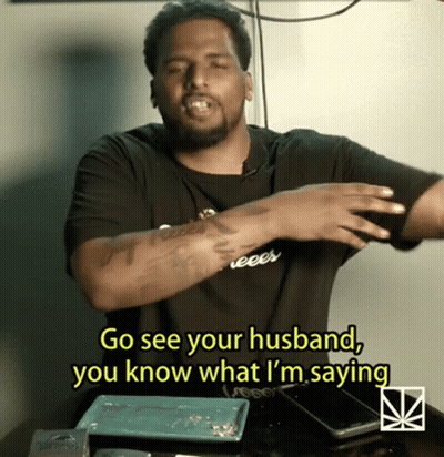 Woman Sitting In Chair Arms Up Saying That's Why You're My Man GIF