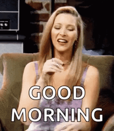 Woman Sitting In Chair Eyes Closed Saying Good Morning GIF