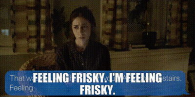 Woman Sitting In Chair Feeling Frisky GIF