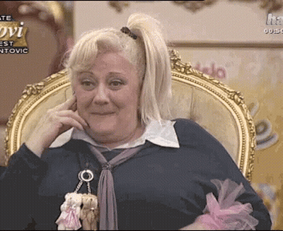 Woman Sitting In Chair Hand On Face Ovi Sign GIF