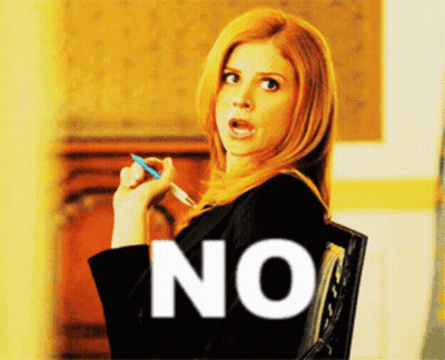 Woman Sitting In Chair Holding Pen Saying No GIF