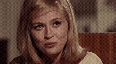 Woman Sitting In Chair Making Face GIF
