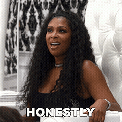 Woman Sitting In Chair Saying Honestly GIF