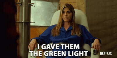 Woman Sitting In Chair Saying I Gave Them The Green Light GIF