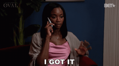 Woman Sitting In Chair Saying I Got It GIF