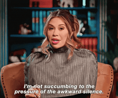 Woman Sitting In Chair Saying I'm Not Succumbing To Pressure Of Awkward Silence GIF