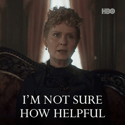 Woman Sitting In Chair Saying I'm Not Sure How Helpful GIF