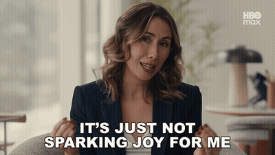 Woman Sitting In Chair Saying It's Just Not Sparking Joy For Me GIF