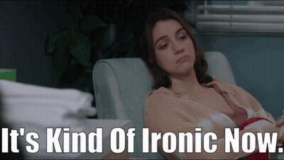 Woman Sitting In Chair Saying It's Kind Of Ironic Now GIF