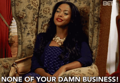 Woman Sitting In Chair Saying None Of Your Damn Business GIF