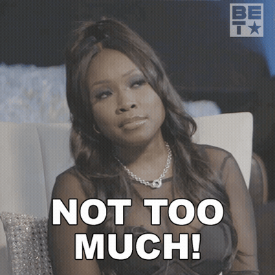 Woman Sitting In Chair Saying Not Too Much GIF