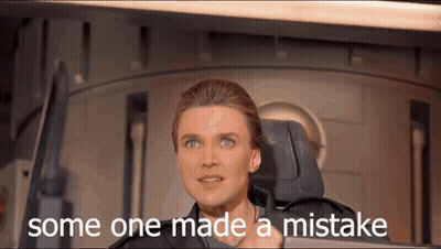 Woman Sitting In Chair Saying Someone Made A Mistake GIF