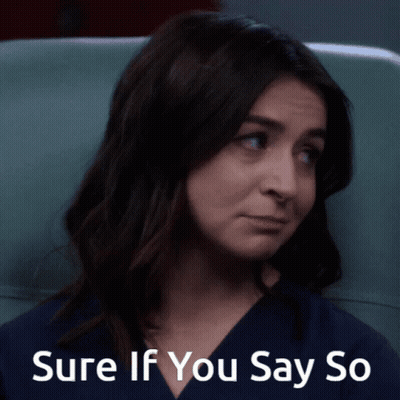 Woman Sitting In Chair Saying Sure If You Say So GIF