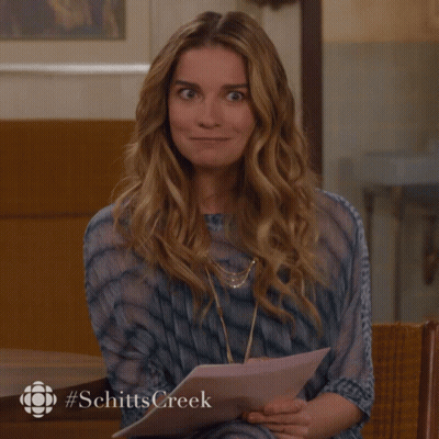 Woman Sitting In Chair #SchittsCreek GIF