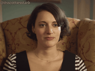 Woman Sitting In Chair Tough Crowd GIF
