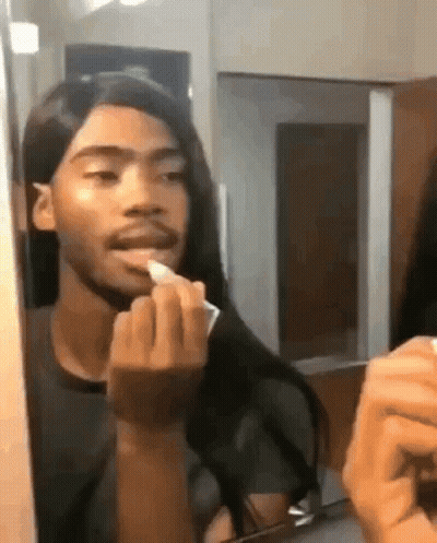 Woman Sitting In Chair With Eyes Closed And Lip Balm GIF