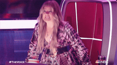 Woman Sitting In Chair With NBC Logo GIF