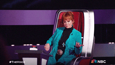 Woman Sitting In Chair With NBC Logo GIF