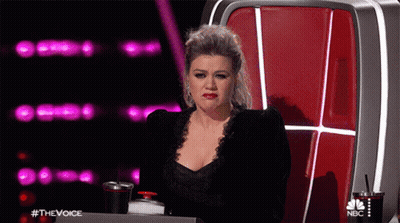Woman Sitting In Chair With NBC Logo GIF