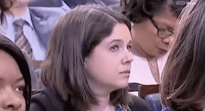 Woman Sitting In Courtroom Row GIF