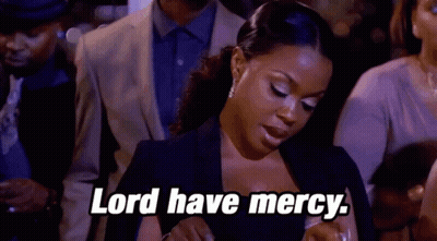 Woman Sitting In Crowd Saying Lord Have Mercy GIF
