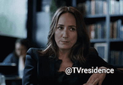 Woman Sitting In Front Of Bookshelf @Tvresidence GIF