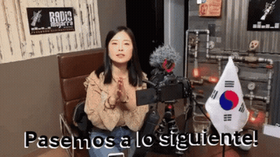 Woman Sitting In Front Of Camera Saying Pasemos A Lo Siguiente GIF