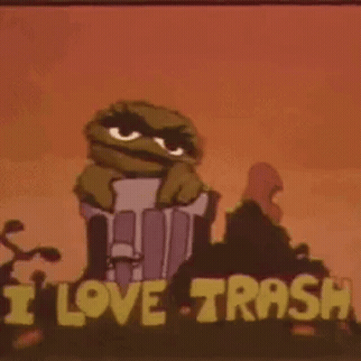 Woman Sitting In Front Of Garbage Time Sign GIF