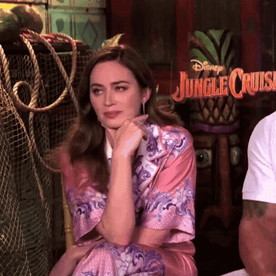 Woman Sitting In Front Of Jungle Cruise Sign GIF