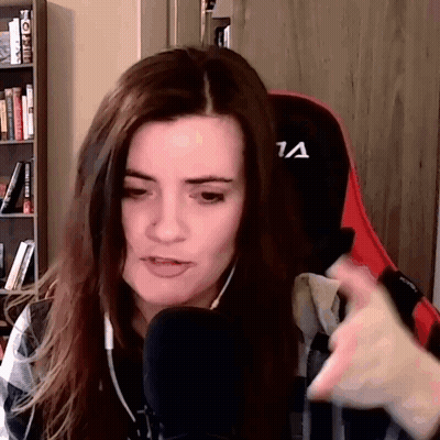 Woman Sitting In Front Of Microphone GIF