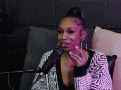 Woman Sitting In Front Of Microphone GIF