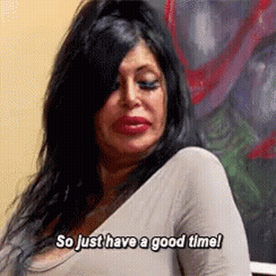 Woman Sitting In Front Of Painting Saying So Just Have A Good Time GIF