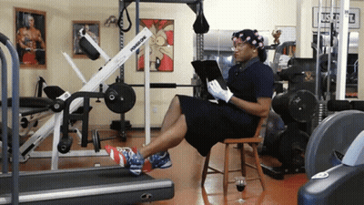 Woman Sitting In Front Of Powerline Machine GIF