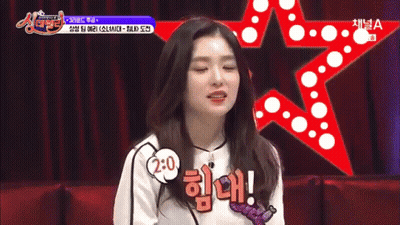 Woman Sitting In Front Of Red Star Saying 2:0 GIF