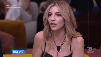 Woman Sitting In Front Of Screen Saying Gfvip GIF